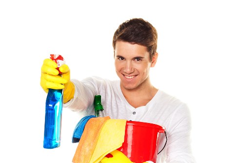 Deep cleaning a bathroom as part of a Harringay move-out service
